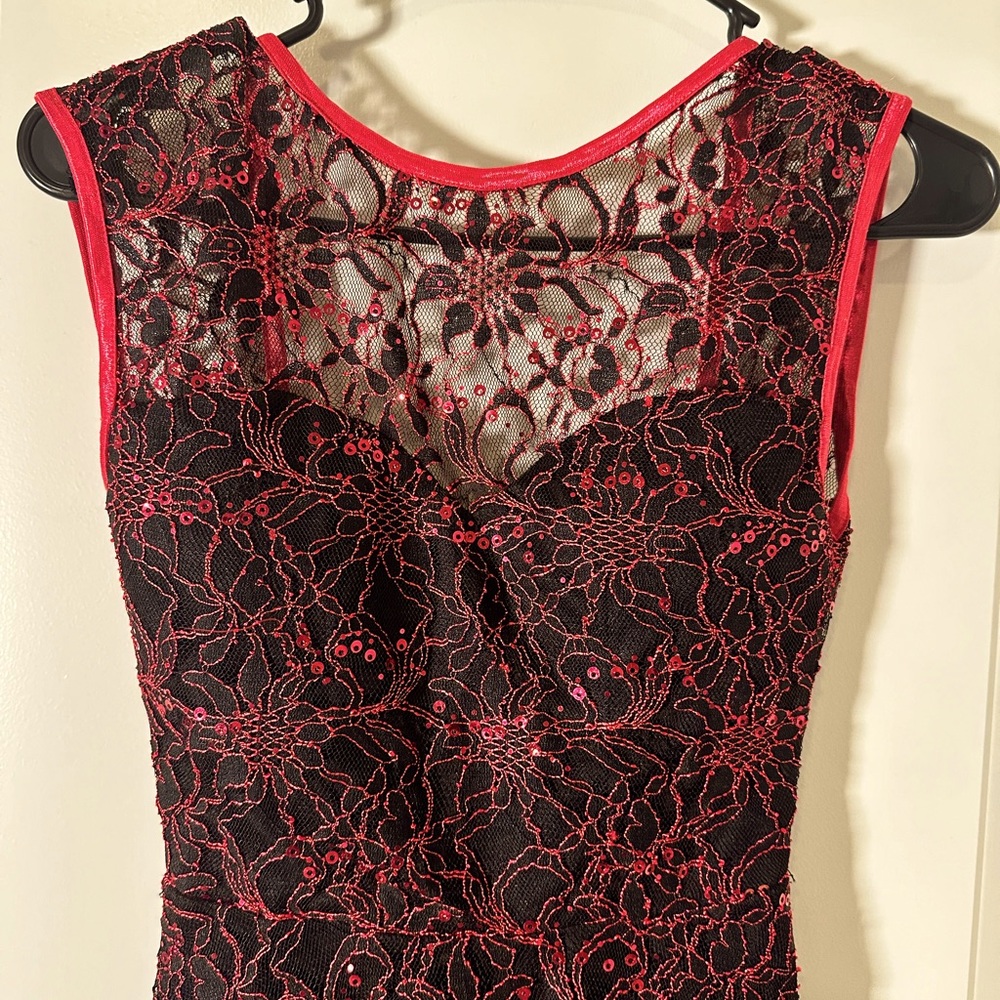 This Australian brand dress features a high-low hem and unique two-toned lace.